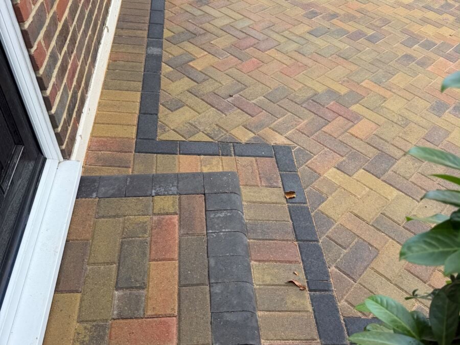 Herringbone block paving with a charcoal border