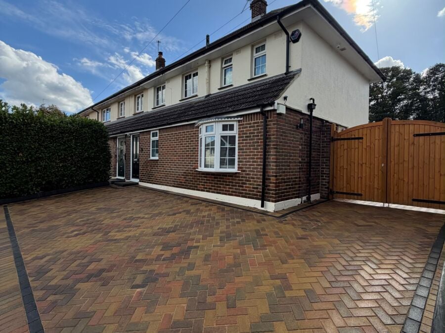 Herringbone block paved driveway in brindle tones