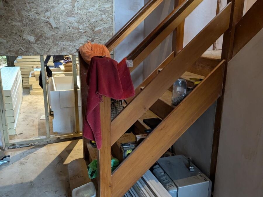 New timber staircase with spindle balustrade installed during a renovation